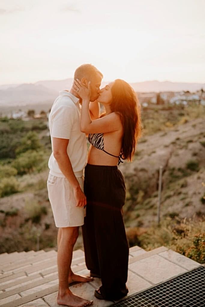 beautiful photo taken of a couple during a spainish wedding reception in granada during golden hour